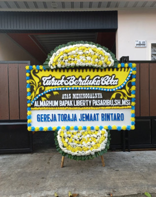 Papan Bunga Duka di Ungkal